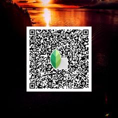 a qr code with the image of a sunset in the background