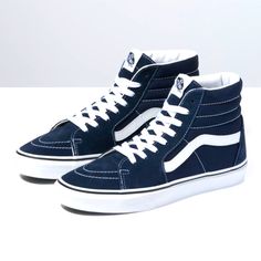 A Monochromatic Suede Design And Vulcanized Rubber Sole Add An Edgy Vibe To This High-Top. The Sk8-Hi Was Introduced In 1978 As Style 38, And Showcased The Now Iconic Vans Sidestripe On A New, Innovative High Top Silhouette. As Only The Second Model Featuring The Recognizable Marker Formerly Known As The “Jazz Stripe,” The Sk8-Hi Brought A Whole New Look To The Vans Family. Honoring That First Legendary High Top, The Sk8-Hi Is Made With Durable Suede And Canvas Uppers In A Variety Of Classic And Vans Azul, Vans Hightop, Navy Blue Vans, Shoes Sneakers High Tops, Rare Vans, Sneakers High Top, Rainbow Sneakers, Vans Store, Blue Vans