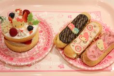 two hello kitty themed desserts are on pink paper plates, one has an ice cream sandwich and the other is a donut