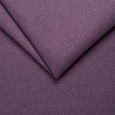 a close up view of the fabric material for a bed sheet or pillowcase in purple