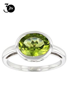 2.29ct Oval Manchurian Peridot(TM) Solitaire, Rhodium Over 10k White Gold Ring. Measures Approximately .46"L x .36"W. Green Peridot, White Gold Ring, 10k Gold, White Gold Rings, Gold Ring, Gold Rings, White Gold, Ring, Green