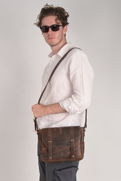 RusticVintage Men's Handmade Bag brings to you this Handmade bag which is suitable for carrying around your office stuff along with your daily items. The Handmade bag is made from PU Leather matterial and comes in an attractive colour. It is designed and can be used by Men & Boys.  Product Type: Cross body messenger travel Bag  Product description: Perfect messenger bag/shoulder bag/cross body bag/handbag/ hiking or travelling Bag, suitable for office, school, outdoor, business and other occasions. Freely adjustable shoulder strap, you can adjust it according to your height and comfort requirements. The White stitching on this product make it uniqe and attractive. Vintage Waxed Satchel Laptop Bag, Retro Satchel Saddle Bag For Everyday Use, Retro Crossbody Saddle Bag For Everyday Use, Vintage Shoulder Laptop Bag For Everyday Use, Vintage Brown Saddle Shoulder Bag For Everyday Use, Vintage Brown Shoulder Saddle Bag For Everyday Use, Vintage Laptop Shoulder Bag For Everyday Use, Vintage Business Shoulder Bag With Waxed Finish, Retro Business Crossbody Shoulder Bag