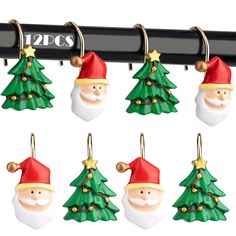 santa claus christmas tree ornament hanging on clothes pegs with black coat rack