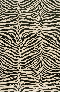 a black and white rug with zebra stripes