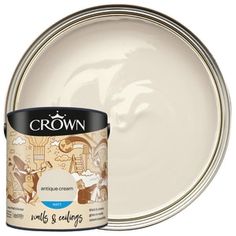 a paint can with a white background and the words crown on it, next to an empty