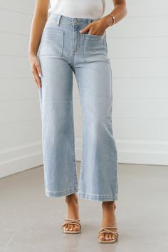 These trendy Light Wash Wide Leg Crop Jeans are a must-have for spring! Features a high rise waist, a wide leg silhouette, front & back pockets, a cropped length, and a button zip fly closure. Style them with a basic tank top or bodysuit along with strappy high heels for a chic day to night outfit! Be sure to complete the look with simple gold jewelry and a matching crossbody. Simple Gold Jewelry, Cropped Jeans Outfit, Day To Night Outfit, Sorority Rush Outfits, Rush Outfits, Gameday Dress, Casual White Dress, Strappy High Heels, Game Dresses