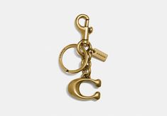 Signature Bag Charm | COACH Coach Signature Bag, Coach Keychain, Cute Wallets, Heritage Fashion, Vintage Character, Mood Board Fashion, Monogrammed Items, Car Keychain, Cute Cars