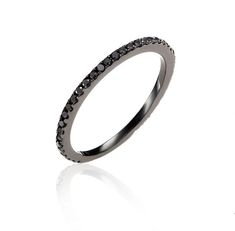 a black diamond ring on a white background