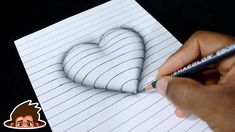 someone is drawing a heart on lined paper