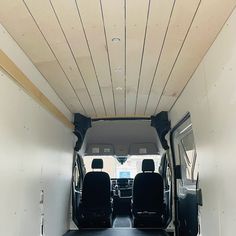 the interior of a van with its doors open