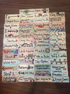 several different types of stickers on a wooden table with the words written in them