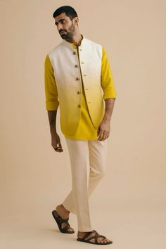 Celebrate the indian festive spirit in our yellow ombre-dyed linen sleeveless jacket. Paired best with a tonal short kurta and slim trousers in off-white. 100% linen  #philocaly #indianwear #occasionwear #menswear Indian Jacket For Men, Mens Festive Wear Indian, Men Short Kurta Designs Style, Mens Short Kurta Designs, Short Kurta For Men Wedding, Haldi Dress For Men Yellow, Nehru Jacket With Shirt And Trouser, Haldi Outfits Men, Ombre Kurta For Men