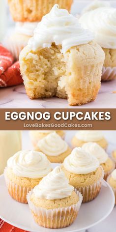 some cupcakes with white frosting and strawberries in the background on a plate