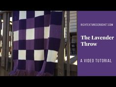 a purple and white blanket is hanging on a fence with text overlay that reads the lavender throw