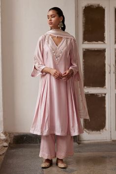 Pink long a-line kurta featuring floral, mirror, pearl and sequin hand embroidery with side pleats. Paired with a palazzo pant, a scallop hem pearl tassel dupatta and an inner slip. - Aza Fashions Anarkali Palazzo Set With Mirror Work, Elegant Palazzo Set With Mirror Work For Navratri, Tassel Dupatta, Pink Kurta, Floral Mirror, November Wedding, Palazzo Pant, A Line Kurta, Festive Collection