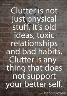 a brick wall with the words clutter is not just physical stuff