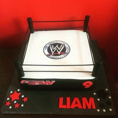 a wrestling ring cake on top of a table