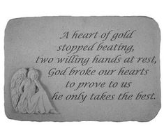 a memorial stone with an angel on it that says, a heart of gold stopped beating two