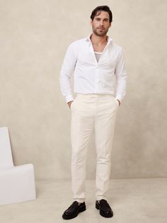 Tailored to perfection, this sleek tuxedo pant is crafted from luxurious Italian virgin wool in a classic Barathea weave, finished with adjustable side tabs for the perfect fit.  Tailored Slim Fit: Mid-rise.  Tapered slim leg.  Fabric from Italy's Marzotto mill.  Zip fly with button closure.  Belt loops.  Front and back pockets.  Fully lined.  Mid rise, relaxed straight fit.  Puddle hem.  Inseams: Regular 32", Long 34" Model: Size M, 6'2" (188cm). White Pants Men, White Pants Outfit, Nude Outfits, Tuxedo Pants, All White Outfit, Guess Men, Cocktail Attire, Slim Leg, Dressy Casual