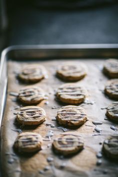 there are many cookies on the baking sheet