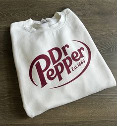 This Gender-Neutral Adult Hoodies & Sweatshirts item by TheSweatshirtLocker has 3 favorites from Etsy shoppers. Ships from Mckinney, TX. Listed on Jul 28, 2024 Dr Pepper Halloween Costume, Dr Pepper Hoodie, Dr Pepper Sweatshirt, Dr Pepper Merch, Dr Pepper Gift Ideas, Dr Pepper Stuff, Dr Pepper Shirt, Birthday Clothes, 2024 Wishlist