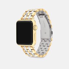 Made exclusively for use with the 38mm 40mm and 41mm Apple Watch® this two-tone stainless steel and gold tone link strap is subtly etched with our Signature. | Coach Apple Watch® Strap, 38 Mm, 40 Mm And 41 Mm - Women's - Two Tone Yellow Gold Stainless Steel Watches With Bracelet Strap, Luxury Metal Watch Accessories, Gold Stainless Steel Timeless Watch Bands, Modern Yellow Gold Metal Watches, Luxury Gold Metal Watch Bands, Luxury Yellow Gold Stainless Steel Watch Accessories, Modern Coach Gold Watch, Luxury Gold Coach Watch Accessories, Modern Gold Coach Watch