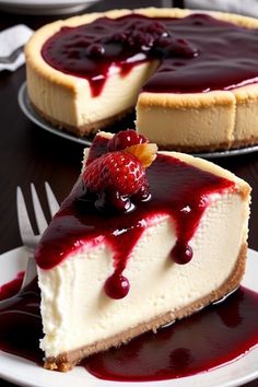 two cheesecakes with raspberry sauce and one has a slice cut out