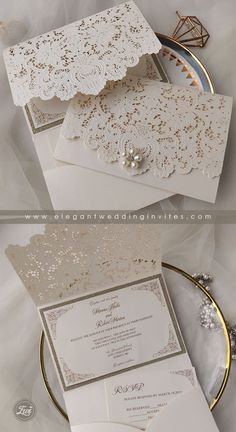 wedding cards and envelopes with lace on them