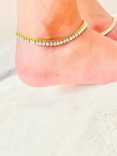 This anklet is beautifully hand made to a excellent quality. Each one is made to order.  Colour- gold These come as a Pair  I can post your order within 5 working days. If you need express delivery just let me know. Fresh Look are not under any circumstances liable for damage which has occurred during delivery transit, and therefore no refunds or exchanges will be offered. All items are thoroughly checked before dispatch. Adjustable Gold Plated Anklets, Adjustable Gold Anklets With Latkans, Gold Tilla Anklets For Wedding, Elegant Gold Toe Ring Anklets, Elegant Gold Anklets For Festive Occasions, Handmade Gold Anklets For Festive Occasions, Dainty Gold Anklets For Wedding, Elegant Gold Festive Anklets, Festive Handmade Gold Anklets