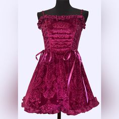 Labeled Us Woman’s Size Xxs Stretchy Fabric Pit To Pit (Flat); 15” Waist (Flat); 12” Color; Raspberry Pink Adjustable Straps Layered Under Ruffle Trim Front Corset Back Zipper Boning Costume Mini Dress With Ruffles, Coquette Mini Dress With Ruffles For Costume Party, Lace Mini Dress With Ruffles For Costume Party, Pink Gothic Costume Dress, Pink Coquette Dress With Ruffles, Coquette Ruffle Dress For Costume Party, Gothic Pink Corset Dress For Party, Fitted Mini Dress With Ruffles For Dress-up Events, Fitted Ruffle Mini Dress For Dress-up Occasions