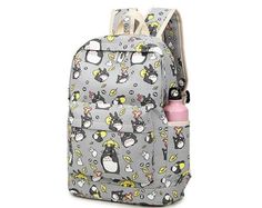 a backpack with penguins and cats on it