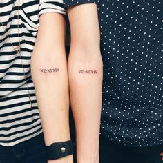 two people with matching tattoos on their arms, one has the words vixv and the other is roman numerals