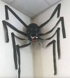 a spider made out of duct tape on the wall