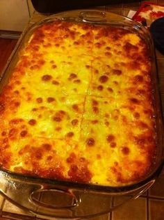 a casserole dish is sitting on the stove top, ready to be eaten