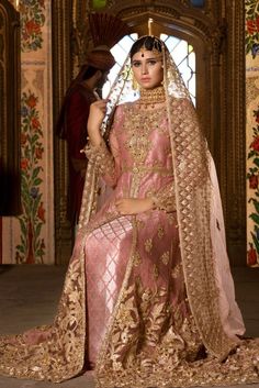 Pakistani designer bridal dresses in tea pink color fully embellished. Pakistani designer bridal dresses fully designed with gotta, zari, nagh and threads Tea Pink Color, Designer Bridal Dress, Wedding Dresses Muslim, Fuchsia Wedding, Organza Lehenga, Velvet Shawl, Bridal Dress Design, Pakistani Designers, Pakistani Bridal