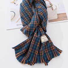 Long rectangular plaid scarf in cozy plaid colors to go with all your autumnal looks. 75" length x 26" width Plaid Scarves For Fall, Orange Fall Scarves, Casual Orange Scarves For Fall, Casual Orange Scarf For Fall, Blue Scarves For Fall, Fall Plaid, Teal Orange, Cozy Fall, Winter Scarf