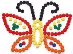 a colorful butterfly made out of plastic beads