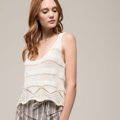 Knitted Tank Top With Tie Tassel Back. Product Details Knit Tank Top Tassel Tie Back Scalloped Edge Soft Lightweight Knit Styling Tip: This Is A Must-Have For Summer. This Soft Knitted Tank Is Super Adorable And Can Be Worn With Shorts, Skirts, Jeans, And Pants. This Tank Can Be Styled As Either Elegant Or Casual Depending On Where You're Headed And Your Mood. Think Of Pairing Pearls, Gold Hoops, Or Diamond Rhinestone Studs. This Lightweight Tank Will Keep You Cool And Looking Stylish All Casual V-neck Pointelle Knit Tank Top, Casual Open Knit V-neck Crochet Top, Pointelle Knit Tank Top For Vacation, Summer V-neck Knitted Top, Cotton Crochet Top For Day Out, Pointelle Knit V-neck Top For Vacation, Pointelle Knit Top For Spring And Summer, Casual Crochet V-neck Top With Knit Fabrication, Casual V-neck Pointelle Knit Crochet Top