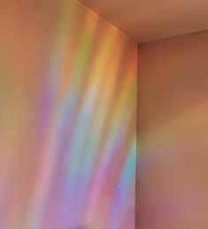 the light is shining on the wall in the room