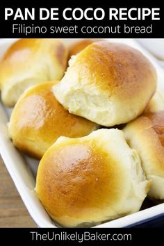 three rolls in a white baking dish with text overlay that reads pan de coco recipe