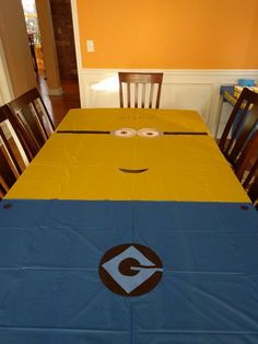 a table with a despicable face on it