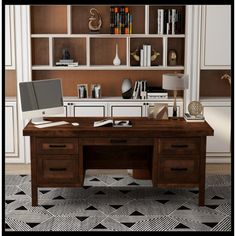 a computer desk sitting in front of a book shelf