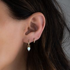 Tear Drop huggies featuring a removable charm - two-in-one design! - - - D E T A I L S - - - * Made of 925 Sterling Silver * THICK plating of 14k Gold, Rose Gold, or Rhodium * Inner Diameter: 8mm * Opal Charm: 5x7mm * Nickel-free & Hypoallergenic - perfect for sensitive ears! * Lab created opal made of the highest quality * Sold as a pair! Earrings on Model: CZ Huggies https://www.etsy.com/listing/609941124/diamond-huggie-earrings-gold-cz-huggies?click_key=ad0f88a0ff55b4da726873a3fb27b276b0cac41 Everyday Teardrop Earrings With Dangling Charms, Dangle Hoop Earrings With Charms, Dainty Dangle Charm Earrings, Dainty Dangle Earrings With Charms, Minimalist Teardrop Earrings With Dangling Charms, Everyday Teardrop Hoop Earrings With Dangling Charms, Huggie Earrings Gold, Diamond Huggie Earrings, Earrings Opal