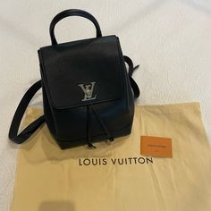 Authentic Louis Vuitton Lockme Backpack Color- Black Measurements Appx- 9.5”H X 5”D X 8”L Includes Everything You See In Listing Pictures Perfect For Any Occasion, Elegant And Stylish Bag! Louis Vuitton Backpacks For Women, Louis Vuitton Trio Backpack, Black Luxury Backpack With Zipper Closure, Black Lv Backpack, Louis Vuitton Bosphore Backpack, Lv Montsouris Backpack, Luxury Black Leather-coated Canvas Backpack, Authentic Louis Vuitton, Stylish Bag