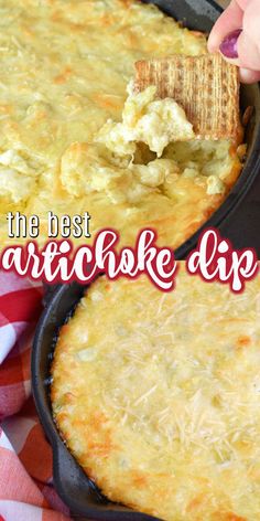 the best artichoke dip recipe is in a cast iron skillet on a red and white checkered tablecloth