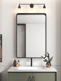 PRICES MAY VARY. Tempered Glass 【Craftsmanship】Our shatter-proof mirror reflects images accrately, gives your bathroom a new modern look. 【Easy Installation】Just measure the two holes in the back of the lightweight mirror, set screws on wall and mount. 【Spacious】The rounded edges and the matte black frame is a nice neutral used in the mirror, suitable for contemporary, modern, traditional and farmhouse style. 【Elegant】This is a mirror that will ''modernize'' your space, a mirror for your bathroo Black Frame Bathroom, Frame Bathroom Mirror, Black Bathroom Mirror, Living Room Vanity, Frame Bathroom, Modern Bathroom Mirrors, Black Vanity Bathroom, Mirror For Wall, Black Mirror Frame