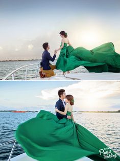 a man and woman in green dress sitting on the back of a boat with their arms around each other