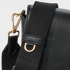 This Saddle Crossbody Bag from A New Day™ with a structured silhouette features a roomy main compartment and an interior zip pocket for easy organization of your belongings, plus an overlapping flap with a gold-tone buckle accent and magnetic closure. Plus, the detachable adjustable shoulder strap makes carrying a breeze whether you sling it over one shoulder or carry it in hand. A New Day™: Style that goes wherever you do. Business Shoulder Bag With Flap And Gold-tone Hardware, Business Shoulder Bag With Gold-tone Hardware And Flap, Gold Satchel With Detachable Strap For Work, Workwear Bags With Metal Hardware And Flap Shape, Crossbody Saddle Bag With Metal Hardware For Work, Crossbody Saddle Bag With Magnetic Closure For Work, Workwear Crossbody Saddle Bag With Magnetic Closure, Gold-tone Crossbody Shoulder Bag For Business, Gold-tone Hardware Crossbody Shoulder Bag For Business