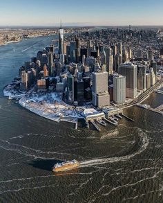 an aerial view of new york city in winter