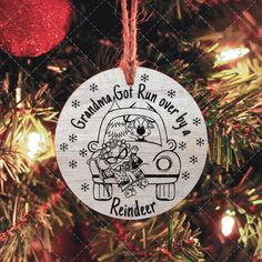 a christmas ornament that says grandma got run over my reindeer on the back of a car